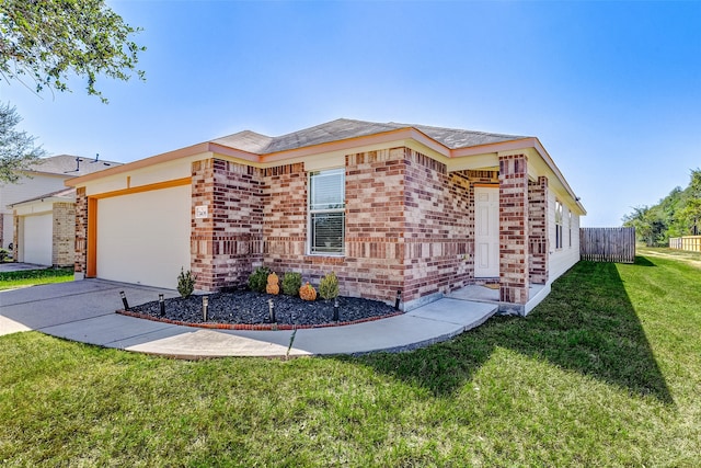 ranch-style home with a front yard and a garage