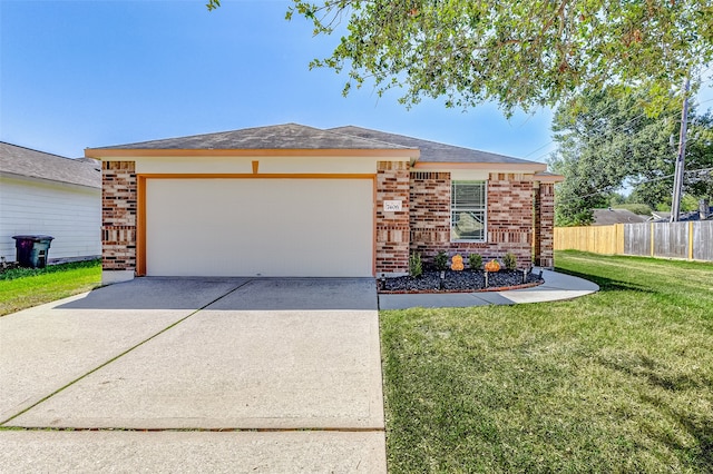 view of front of house with a front lawn and a garage