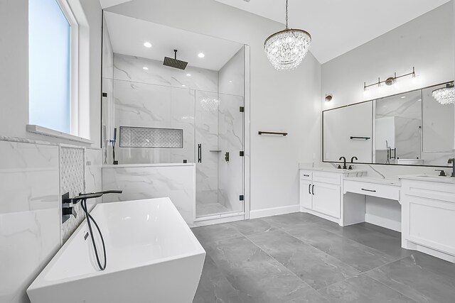 bathroom with vanity, plus walk in shower, and a chandelier