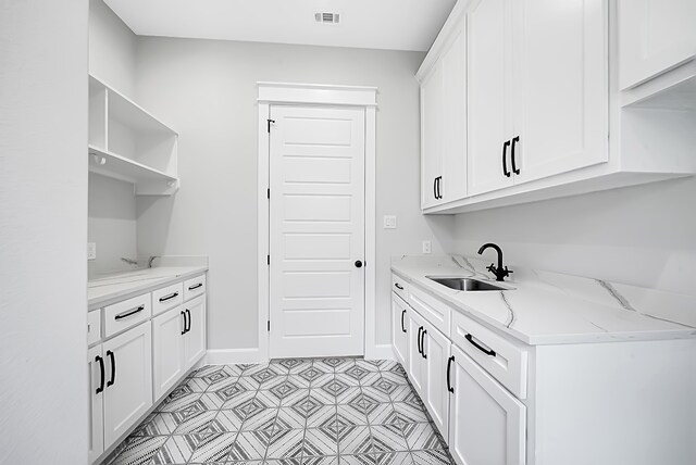 laundry area featuring sink