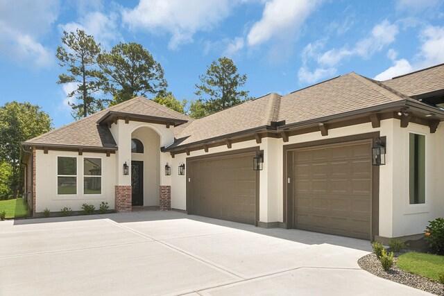 view of front of property featuring a garage