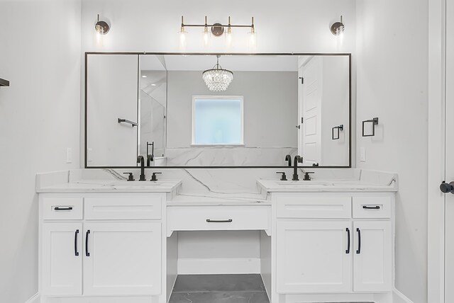 bathroom with walk in shower and vanity