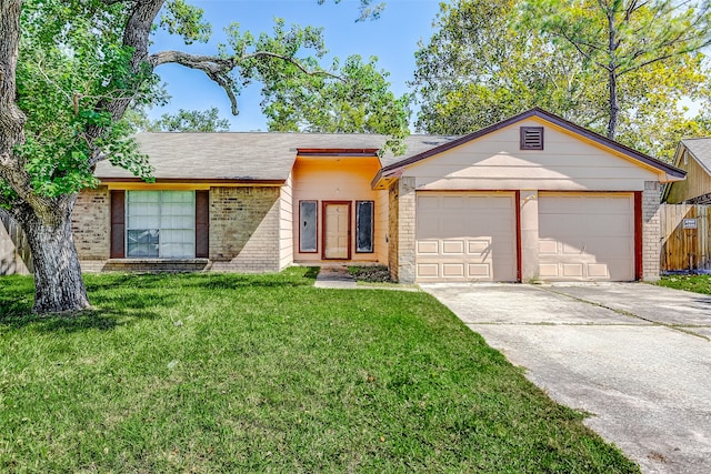 ranch-style home with a front yard and a garage