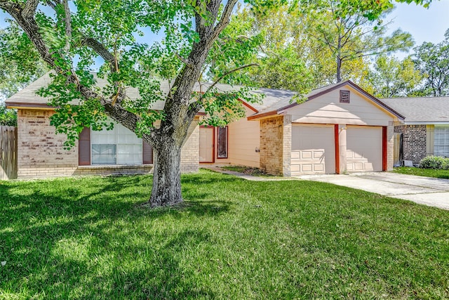 single story home featuring a garage and a front lawn