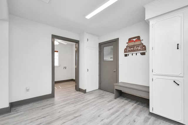 mudroom with ceiling fan and light wood-type flooring