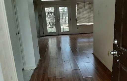 entryway featuring french doors and dark hardwood / wood-style flooring