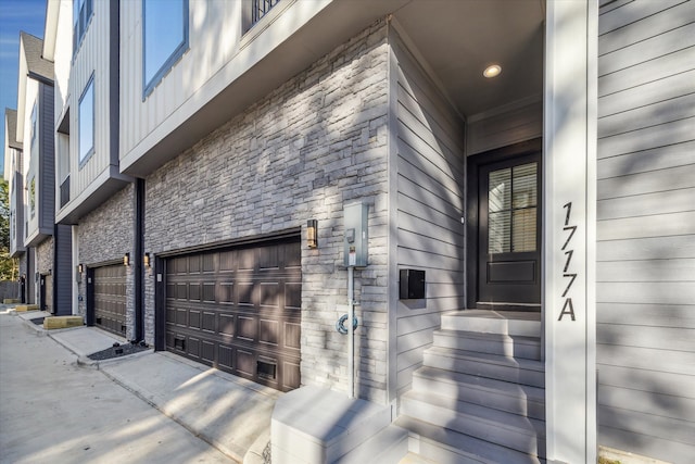 property entrance with a garage