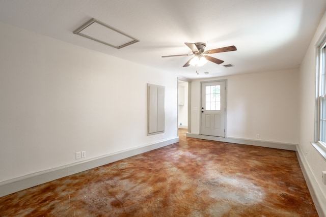 spare room with ceiling fan