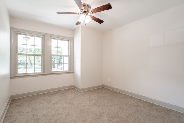 unfurnished room featuring ceiling fan