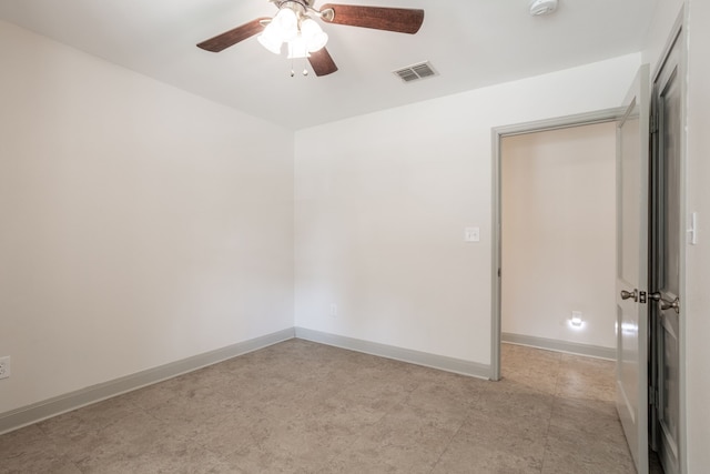 empty room with ceiling fan