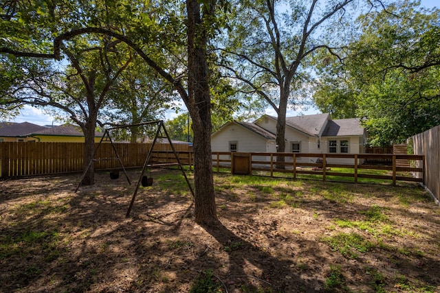 view of yard featuring a playground