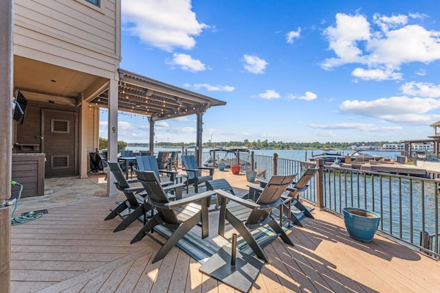 wooden deck with a water view