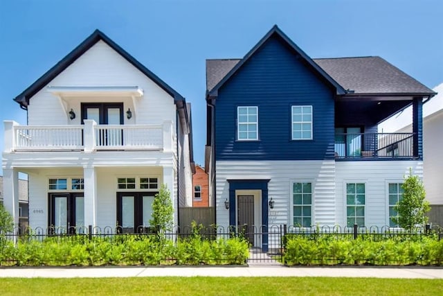 view of front of home with a balcony