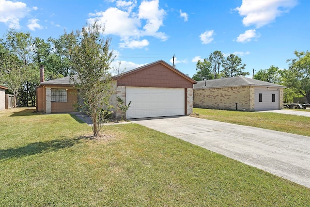 single story home featuring a garage and a front lawn