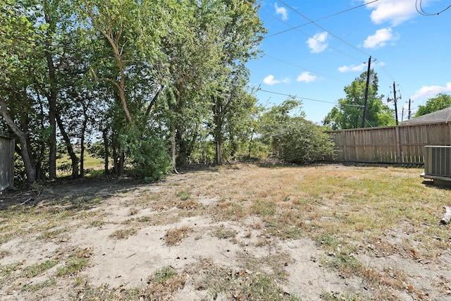 view of yard featuring central AC