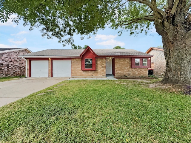 single story home with a garage and a front yard