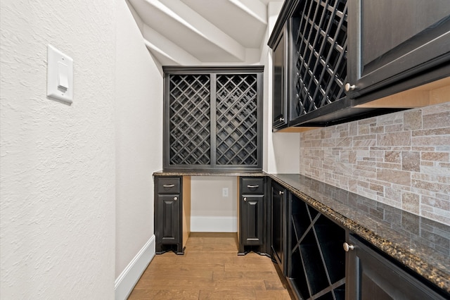 wine area featuring light hardwood / wood-style flooring