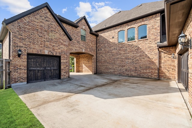 exterior space featuring a garage