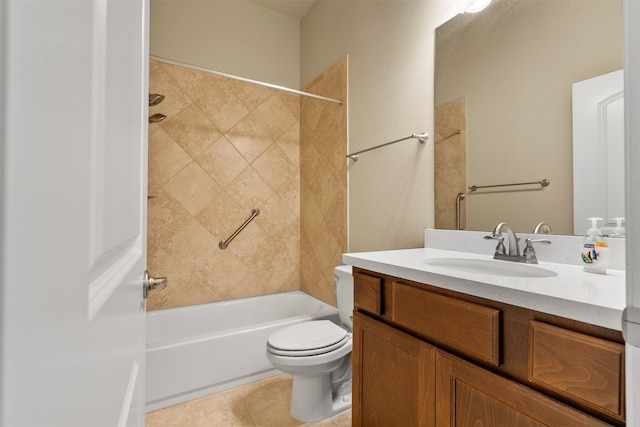 full bathroom with toilet, vanity, tiled shower / bath combo, and tile patterned flooring