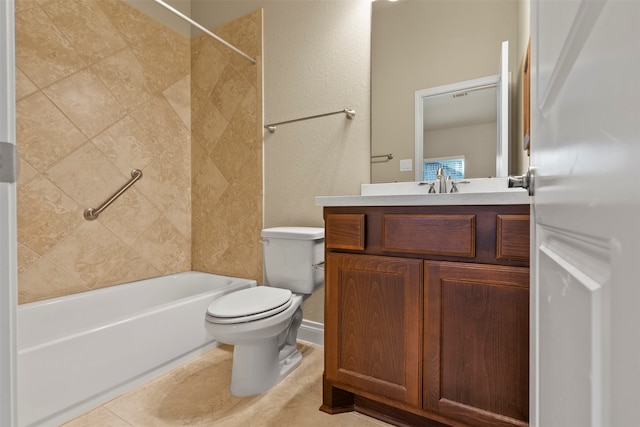 full bathroom with toilet, vanity, tile patterned floors, and tiled shower / bath