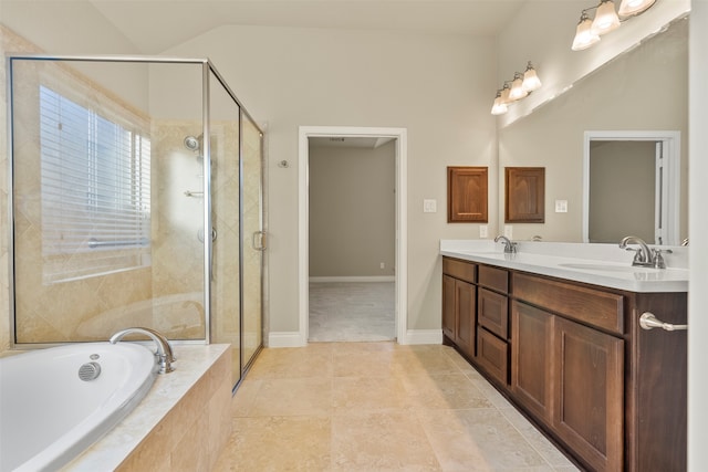 bathroom with tile patterned flooring, vanity, and independent shower and bath