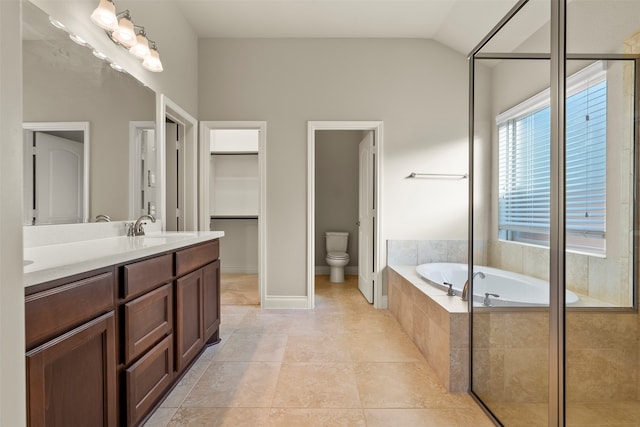 full bathroom featuring tile patterned flooring, lofted ceiling, shower with separate bathtub, toilet, and vanity