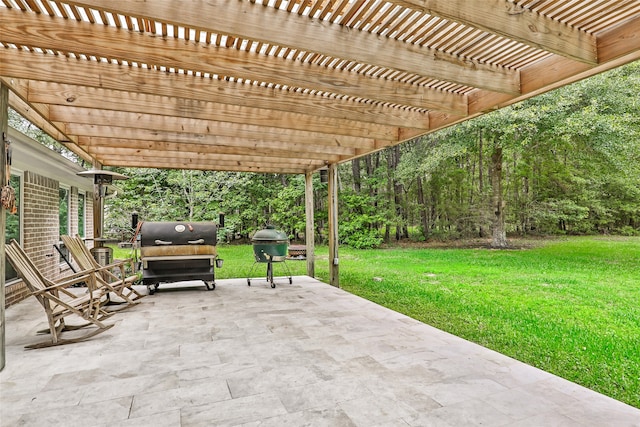 view of patio featuring area for grilling and a pergola