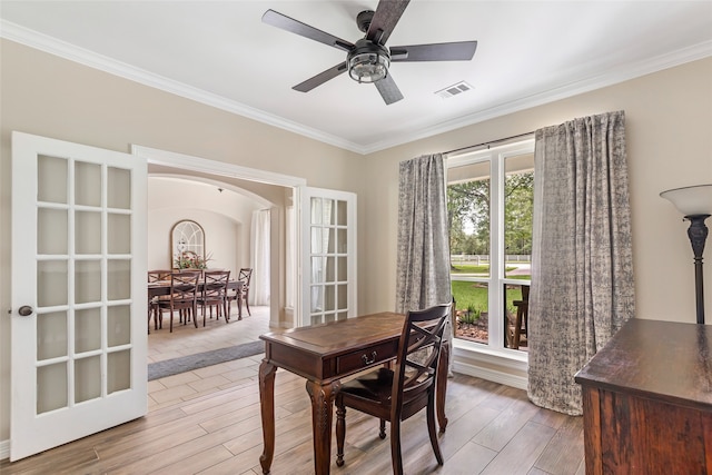 dining space with ceiling fan, light hardwood / wood-style flooring, french doors, and ornamental molding