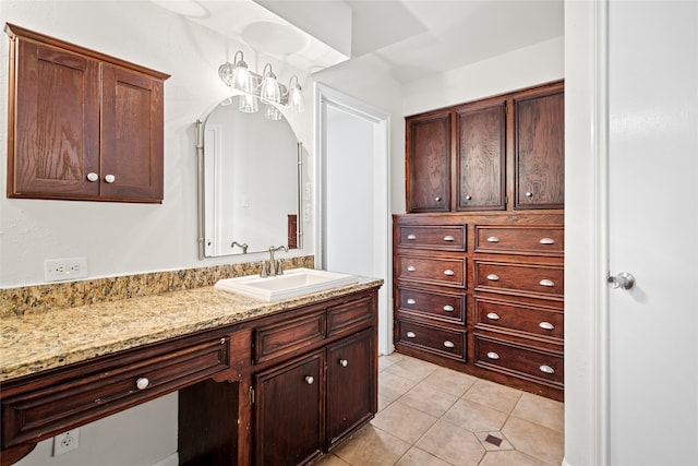 bathroom featuring vanity and tile patterned flooring