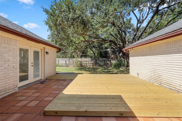 1133 Sally Anne Dr, Rosenberg, TX 77471 - wooden deck featuring french doors and a fenced backyard