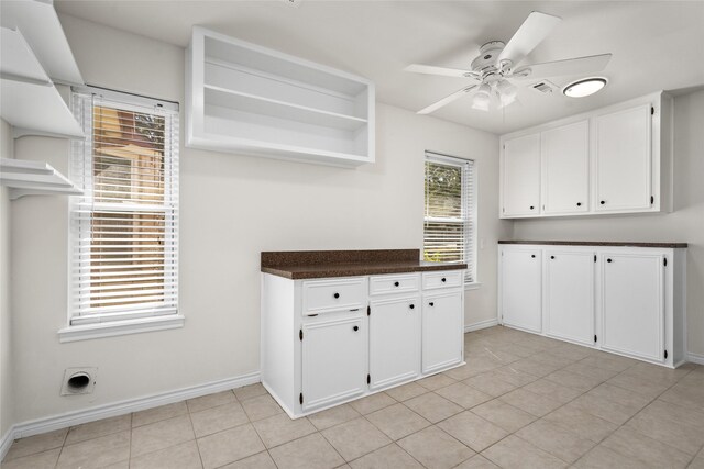 1133 Sally Anne Dr, Rosenberg, TX 77471 - laundry area with a ceiling fan, baseboards, and light tile patterned flooring