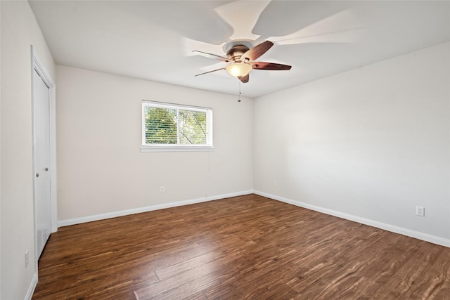 1133 Sally Anne Dr, Rosenberg, TX 77471 - unfurnished bedroom with wood finished floors, baseboards, a closet, and ceiling fan