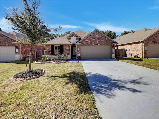 view of front facade featuring a front lawn and a garage