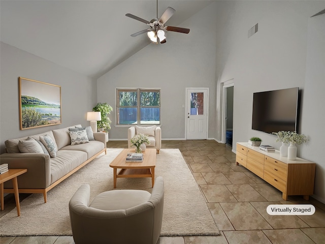 tiled living room featuring high vaulted ceiling and ceiling fan