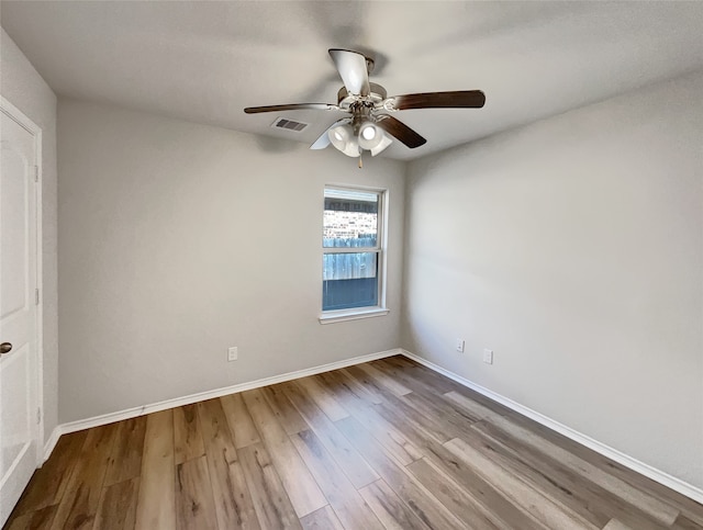 unfurnished room with light hardwood / wood-style floors and ceiling fan