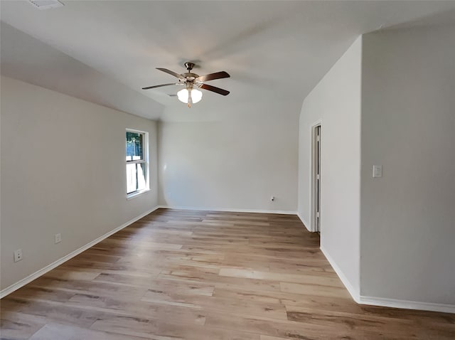 spare room with ceiling fan and light hardwood / wood-style flooring