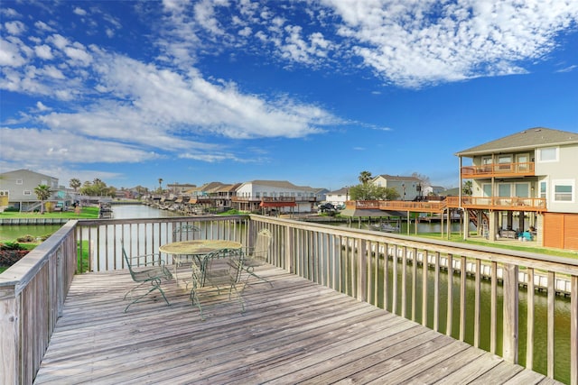 deck featuring a water view