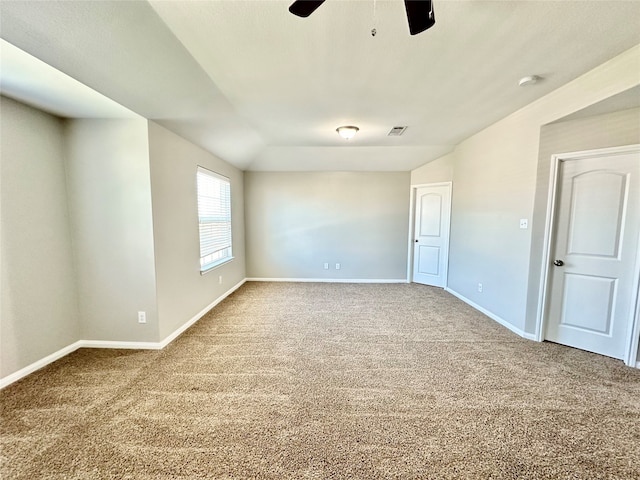 unfurnished room with carpet and ceiling fan