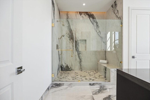 full bath featuring marble finish floor, a marble finish shower, and recessed lighting