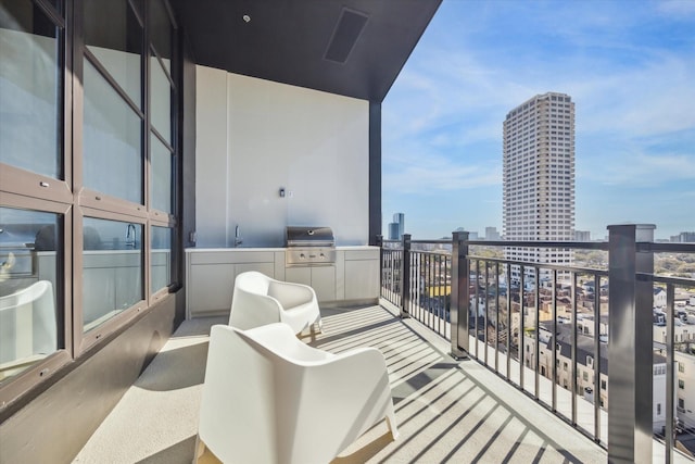 balcony with grilling area and a city view