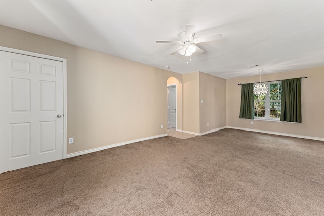 carpeted empty room with ceiling fan