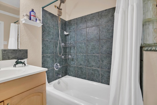 bathroom with shower / tub combo and vanity