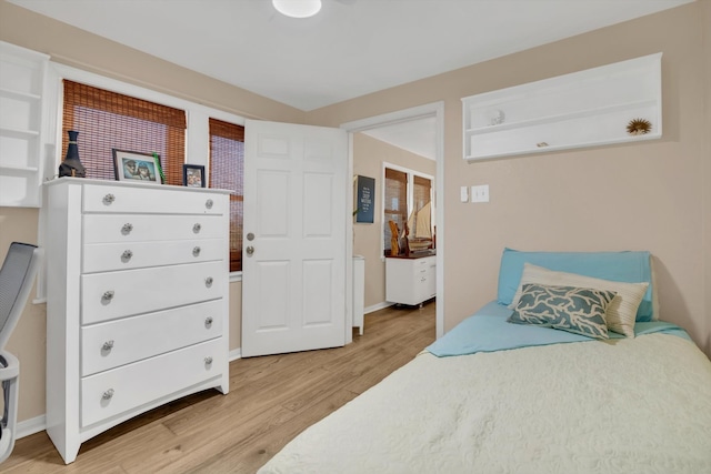 bedroom featuring light wood-type flooring