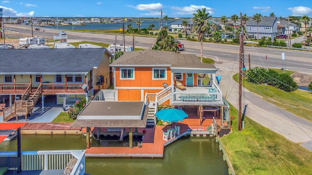 drone / aerial view with a water view