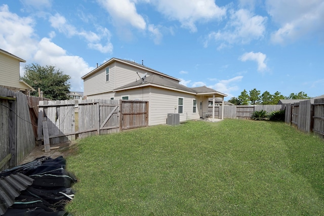 view of yard with central AC