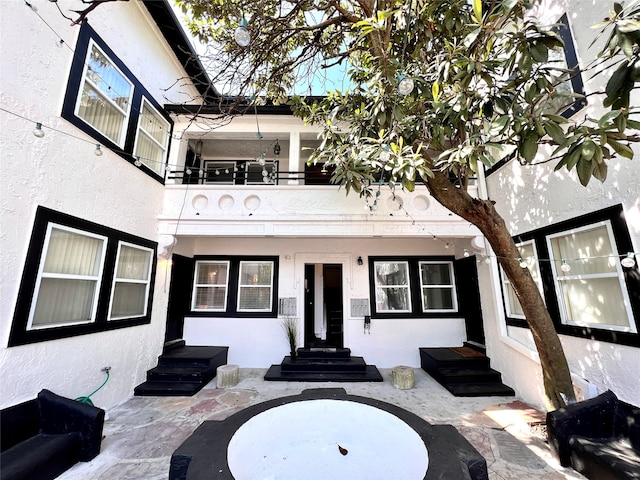 doorway to property with a balcony