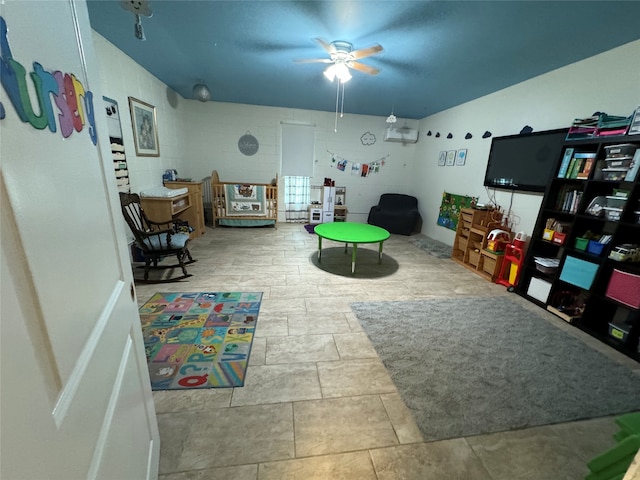 rec room featuring ceiling fan