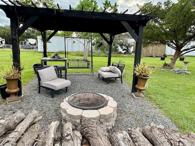 view of patio featuring a fire pit, a storage shed, and a pergola