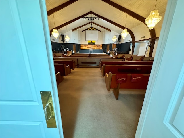 rec room featuring lofted ceiling with beams