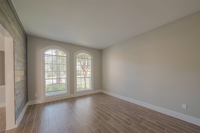 empty room featuring hardwood / wood-style flooring